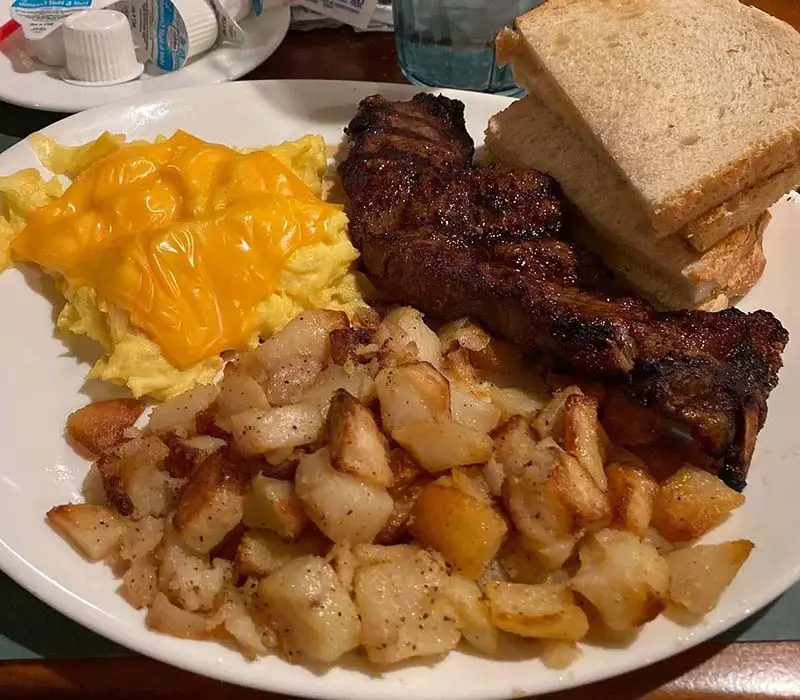 Eating steak and eggs for breakfast at a restaurants in Stamford, Connecticut. 
