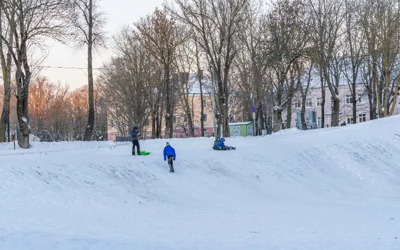 Kids sledding in CT during the winter. 