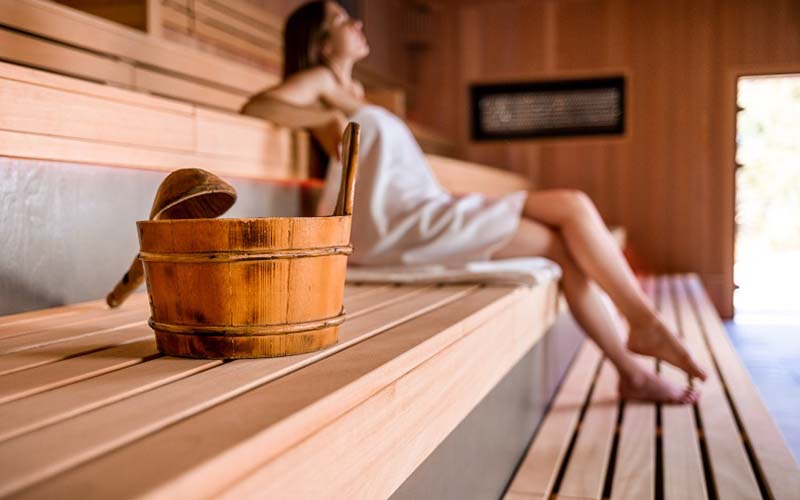 Woman relaxing at a spa hotel in CT.