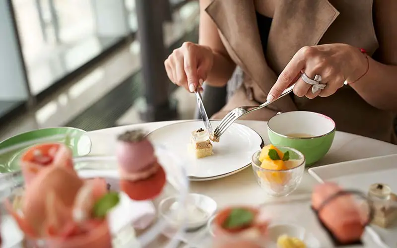 People eating a meal at one of the top restaurants for fine dining in CT.