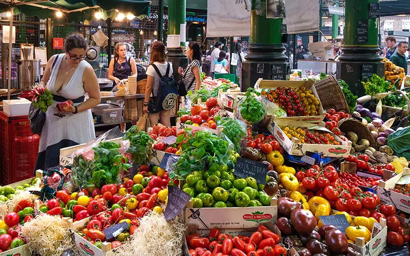 People shopping at a farmers market in CT.