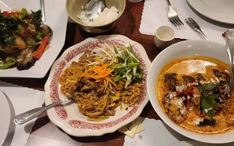 Eating Thai curry at a Thai restaurant in CT.